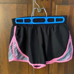 Pair of junior shorts. Size XS. Brand is Tek Gear